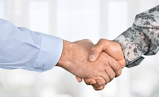 business-agreement-handshake-on-background-close.png