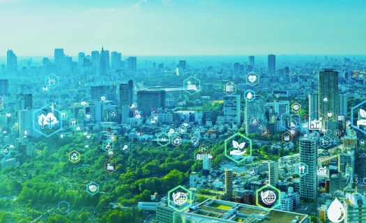 Landscape aerial view of city with floating icons above buildings, parks, roads, etc. indicating growth