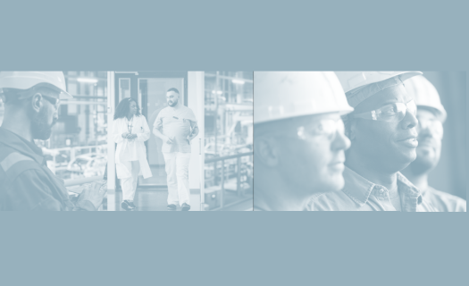 workers wearing construction hats staring into distance, workers in manufacturing on work floor, greyed out image