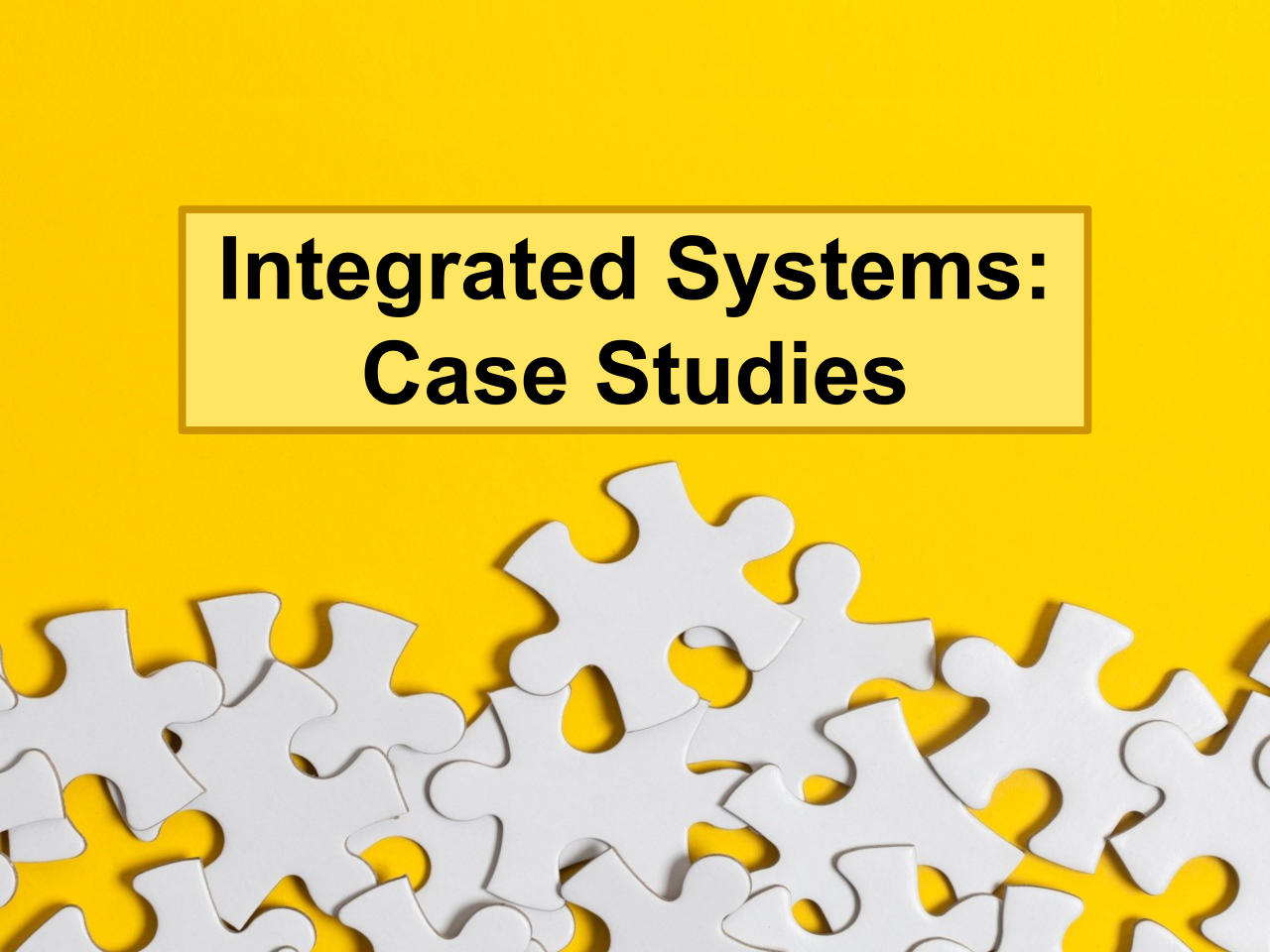 Puzzle pieces on a yellow background with text Integrated Systems Case Studies