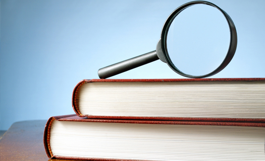 Magnifying Glass on Books