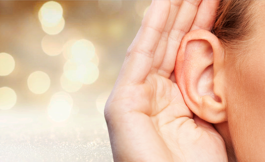 girl listening her hand ear