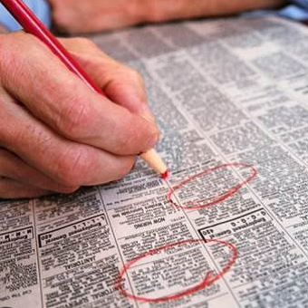 Job Ads Circled in Newspaper