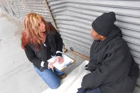 Social Worker Interviewing Homeless Person
