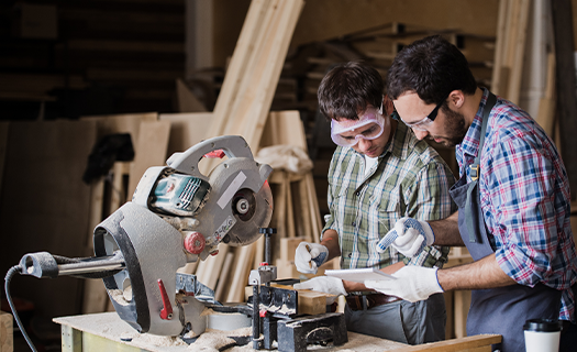 Two Men Working