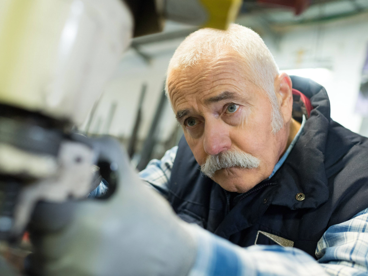 older worker in factory