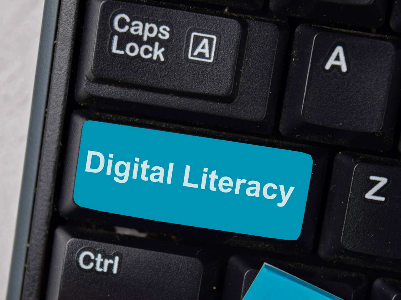 Key cap that says digital literacy 