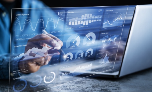 Business professionals looking at digital dashboard