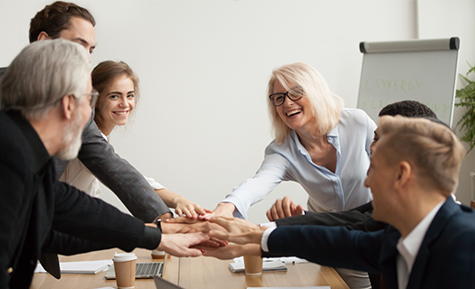 Happy smiling corporate team.png