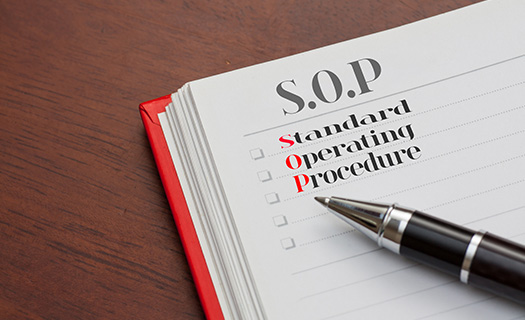 close-sop-on-notebook-pen