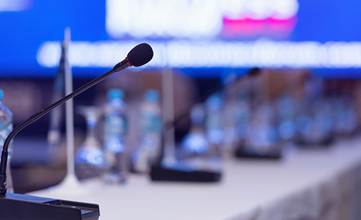 front-view-microphones-during-business-conference