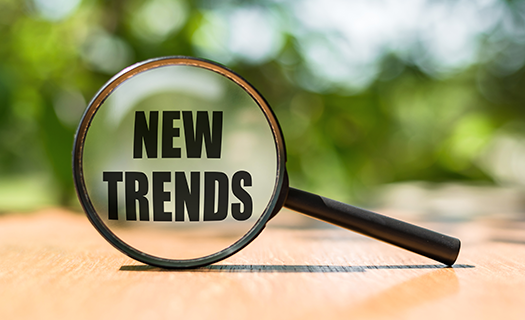 new-trends-text-written-on-magnifying.png