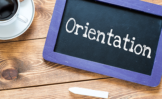 orientation-handwritten-white-chalk-on-blackboard.png