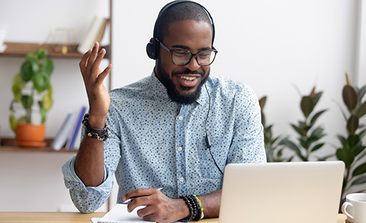 smiling-african-american-employee-headphones-using.png